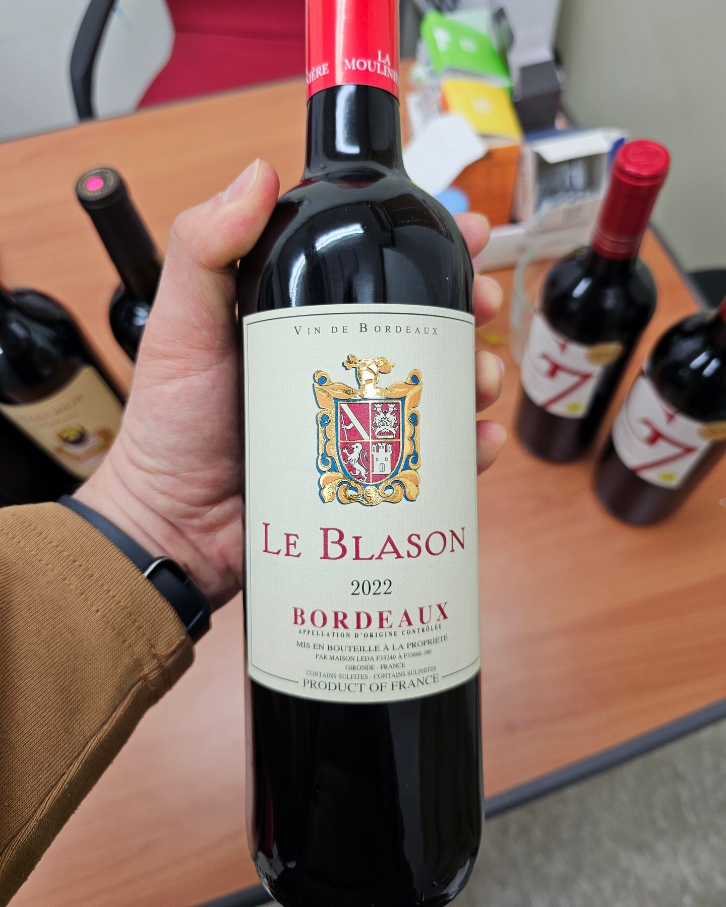 A bottle of Château Haut Selve Le Blason Bordeaux.